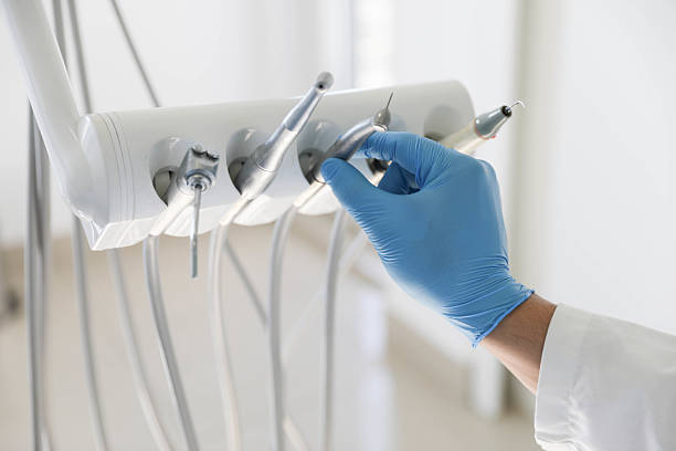 Professional Tooth Extraction technician working in Four Bridges, OH